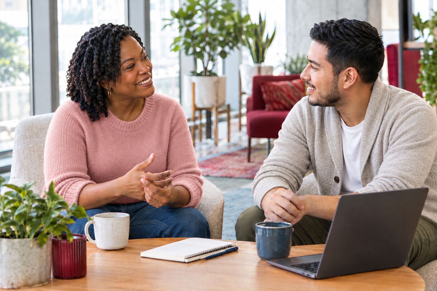 Two professionals in a one-on-one conversation